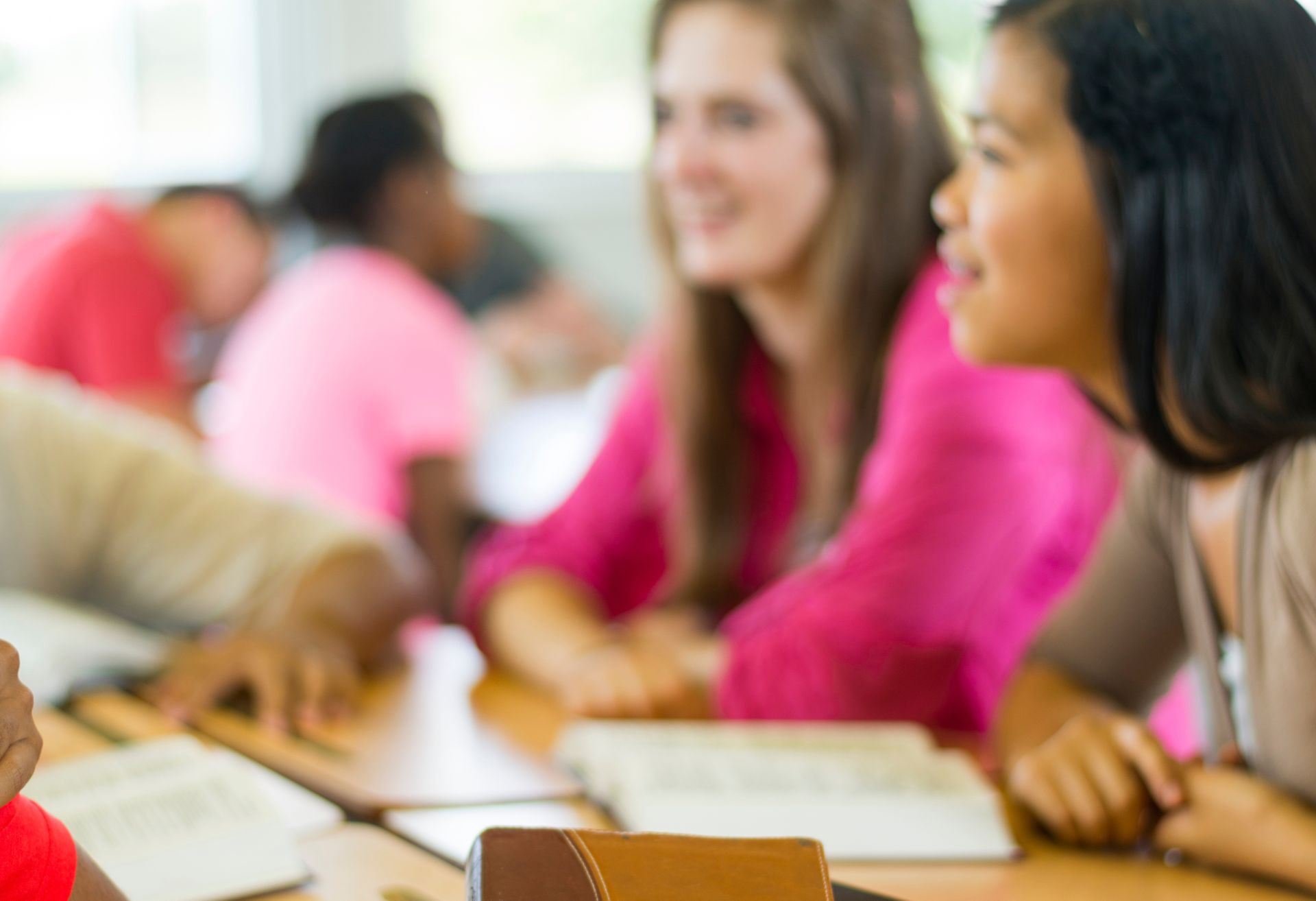 Photograph of students studying the bible