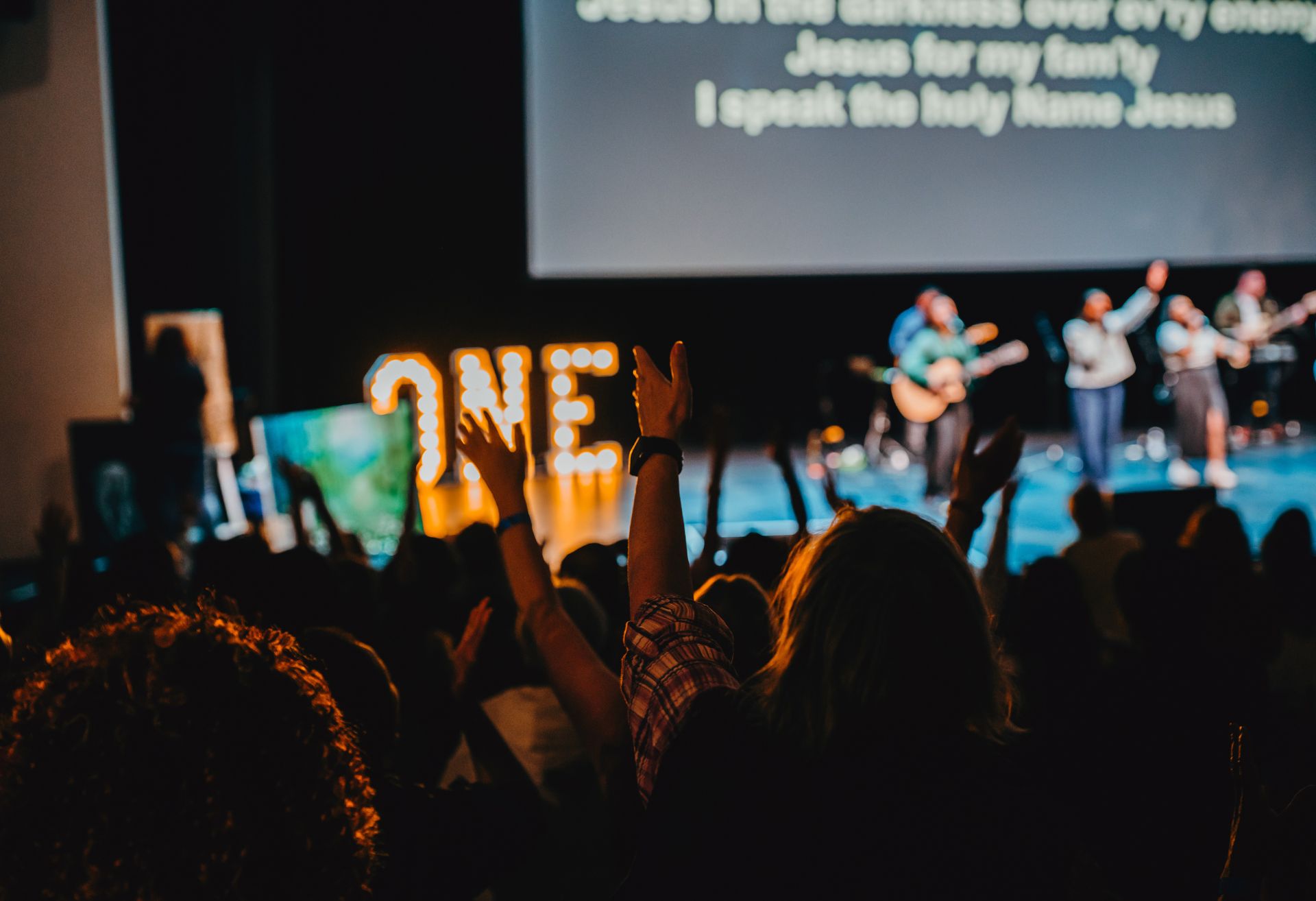 Photograph of stage and crowd taken at the Aspire One event