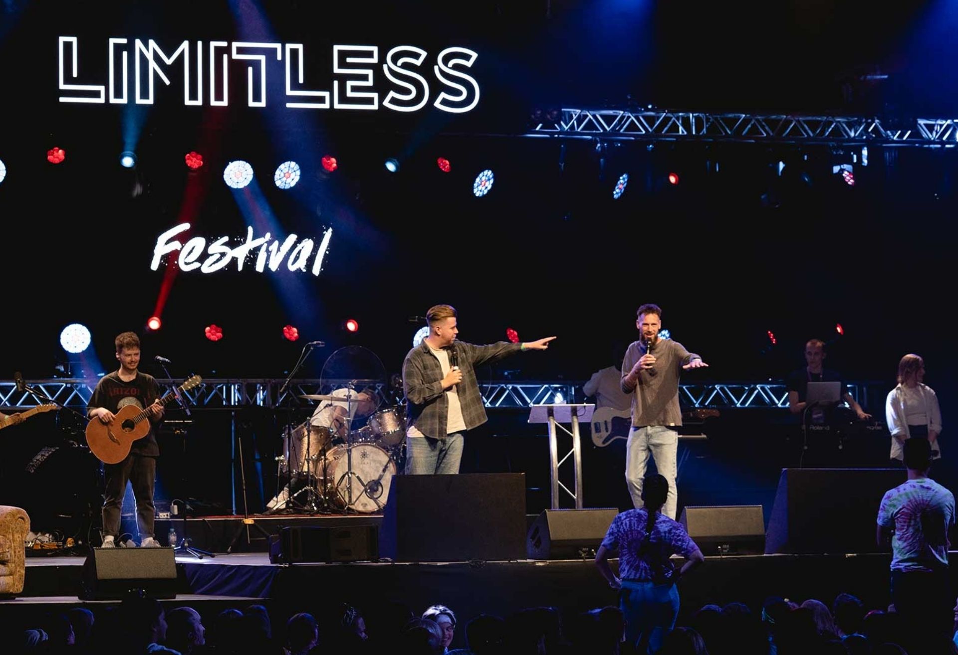 Photograph of Tim Alford on stage at Limitless Festival